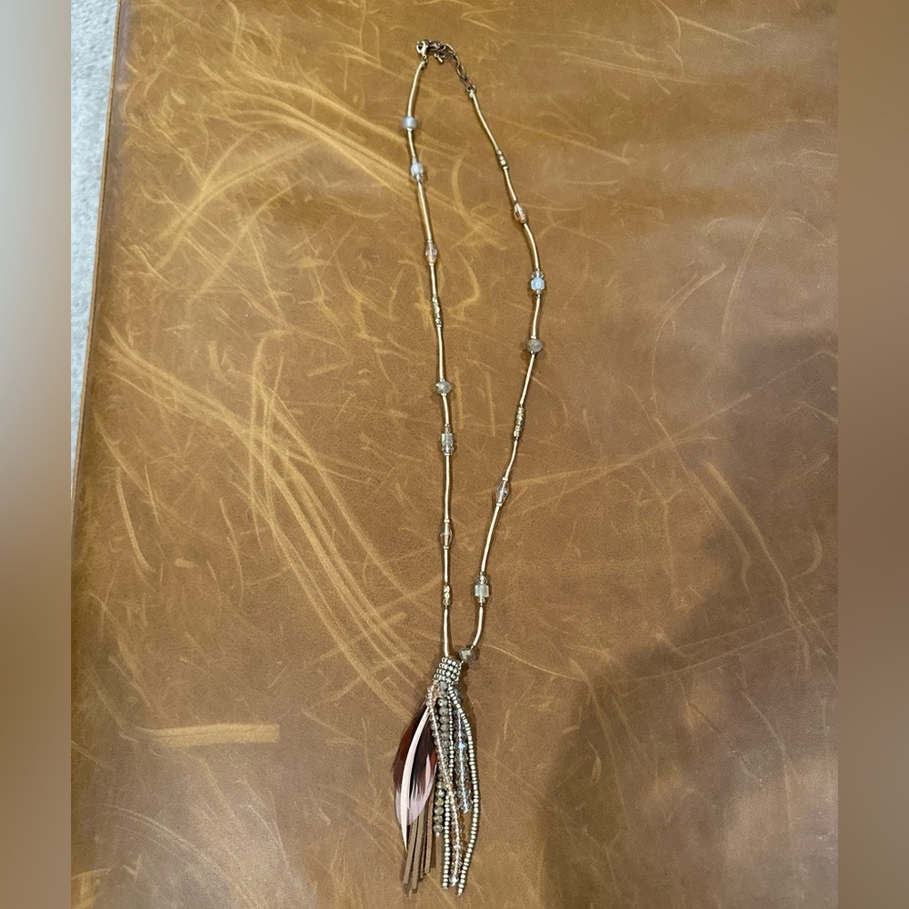 Tan feathered and beaded tassel necklace